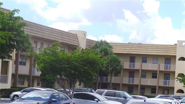 Building Photo - 8465 Sunrise Lakes Blvd