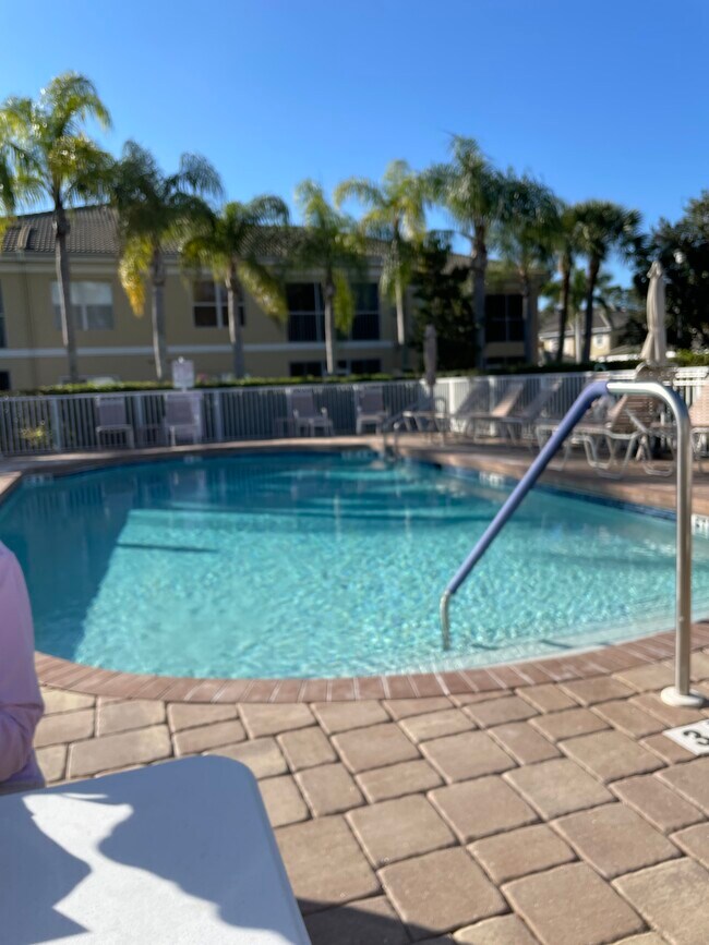 Pool is steps away from condo - 6334 Grand Oak Cir