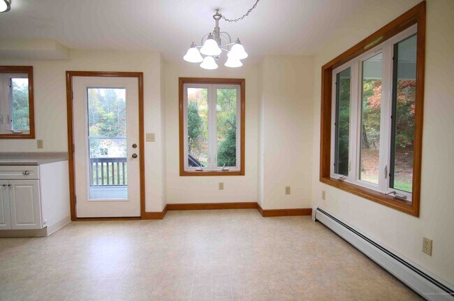 Dining Area with door to Deck - 310 Sebago Rd