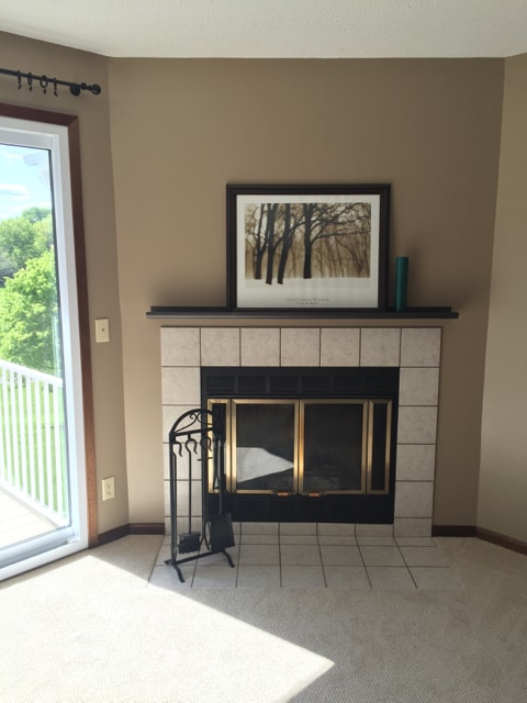 Wood-burning fireplace in living room - 14473 Fairway Dr