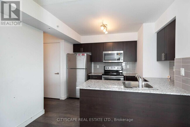 Photo du bâtiment - 1420 Dupont St