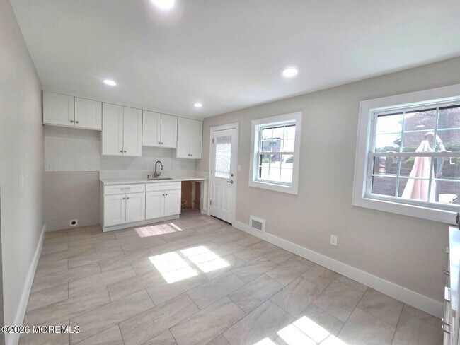 Foto del edificio - 92 Village Green Way