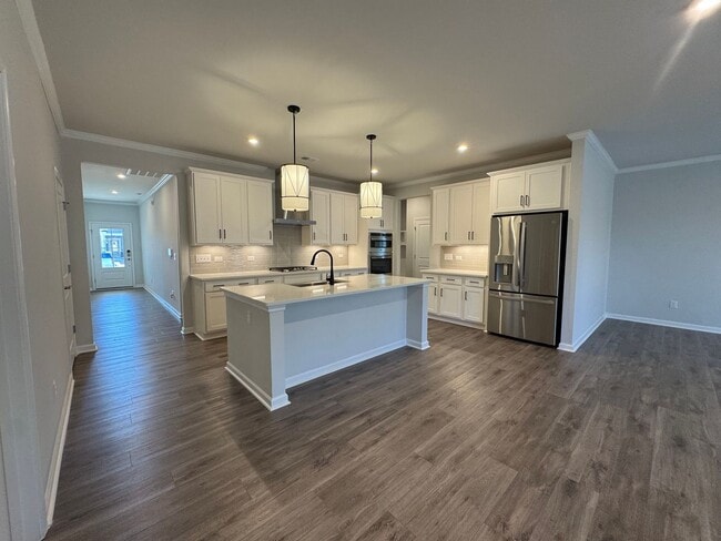 Building Photo - Spacious 1.5-Story 4BR Home with Bonus Room in Active 55+ Community