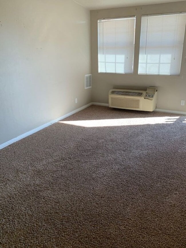 Building Photo - SpringTree Gardens Condominium