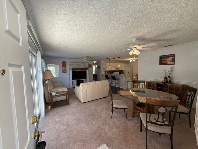 Foto del edificio - Delightful Turnkey Furnished, 2 bed, 2 Bath Patio Villa available for ANNUAL LEASE
