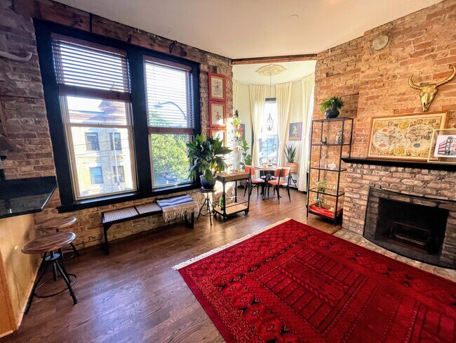 Main living space; room for additional dining table - 2301 W North Ave