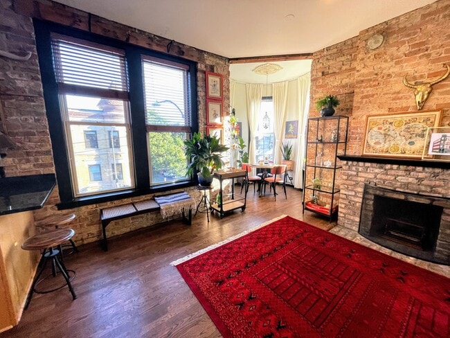Main living space; room for additional dining table - 2301 W North Ave