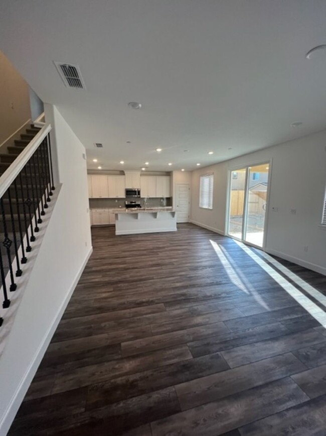 Building Photo - Solar Home with 4 Bedrooms in the Heart of...