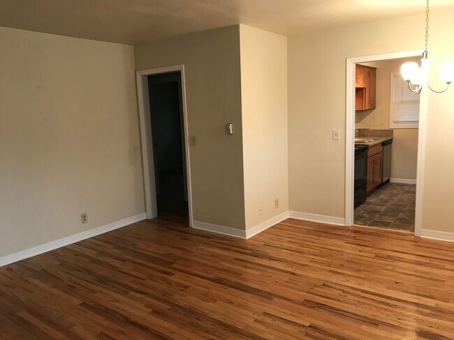 To hallway & kitchen from living room - 5895 SW Tucker Ave
