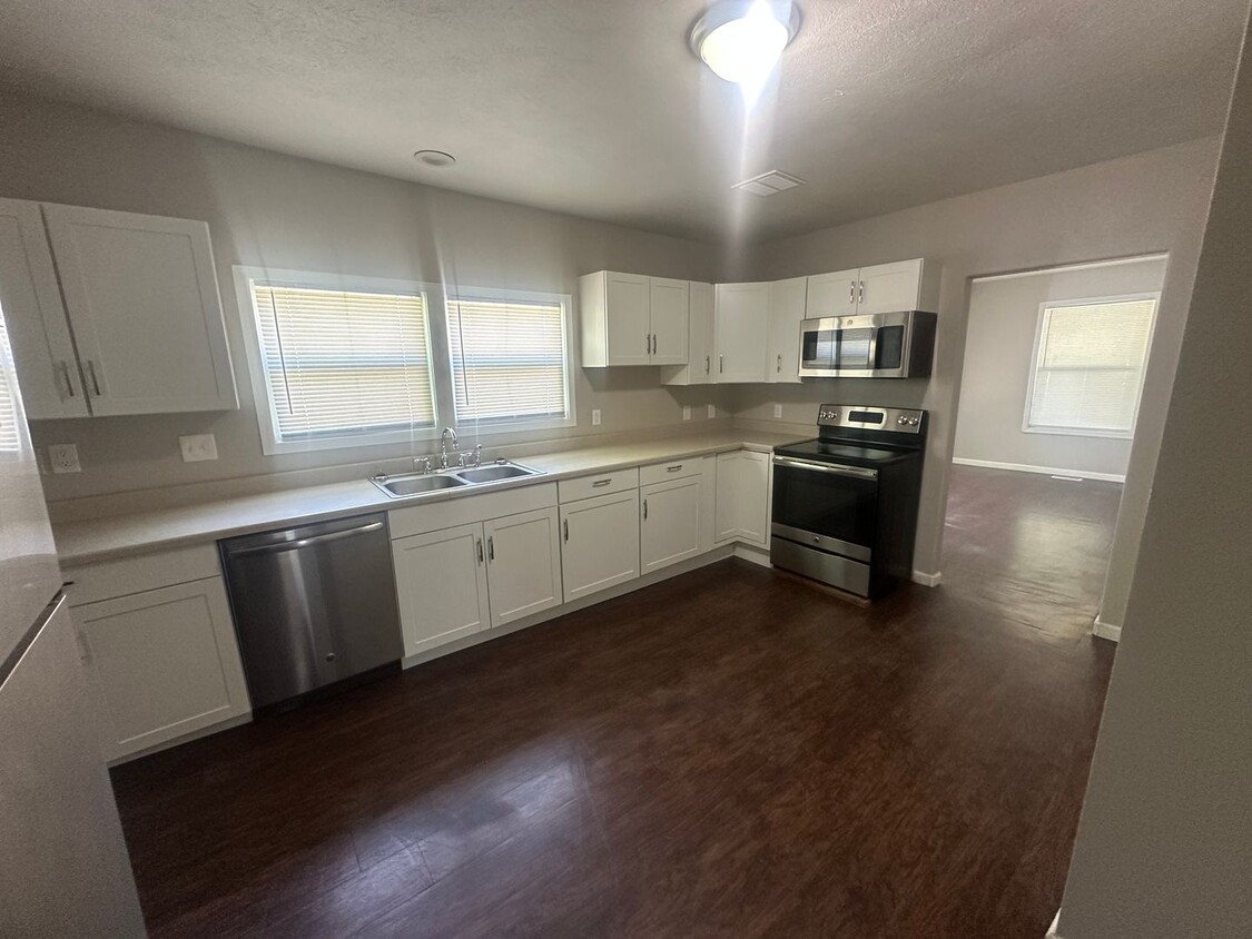 Primary Photo - Spacious 4-Bedroom Home Near Northtown Mall