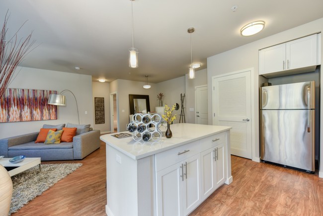 Kitchen with Refrigerator - Madison Bellevue Apartments