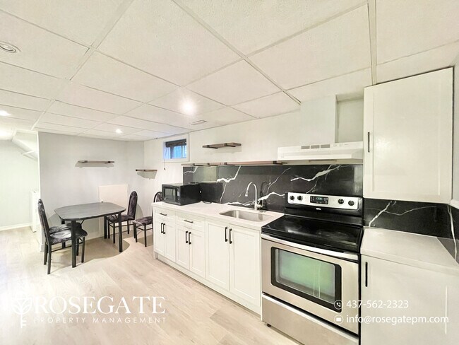 Building Photo - Charming 3-Bedroom Basement Apartment in B...