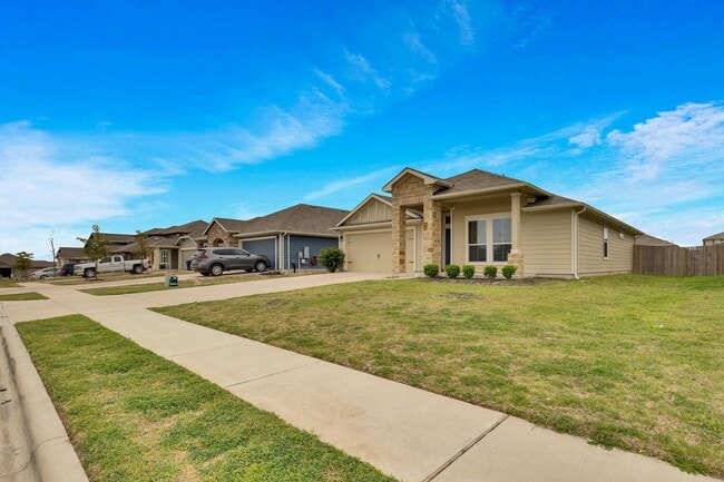 Building Photo - Modern Elegance Awaits: Discover Your Oasis in Hutto, TX