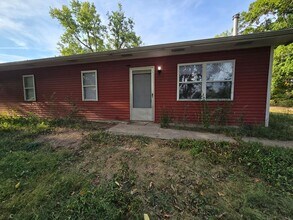 Building Photo - 3813-3815 N Hinkson Creek Rd