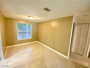 Building Photo - 4980 Coral Wood Dr