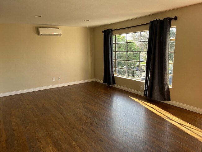 Building Photo - Updated 2BR/1BA with a pool, solar and yar...