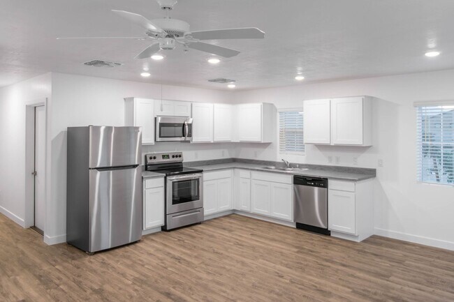 Building Photo - $999 BASE RENT! Gorgeous 2-Story Premier T...