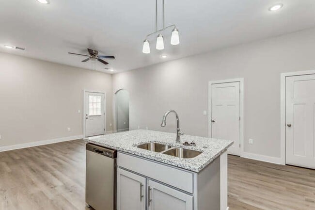 Building Photo - Gorgeous Town Home with fenced yard - pets...