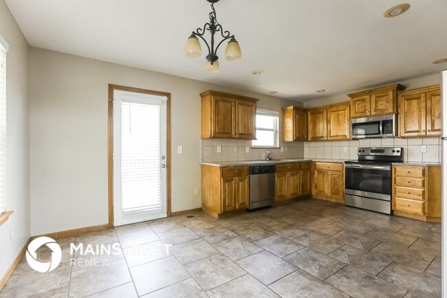 Building Photo - 12210 E 56th Terrace