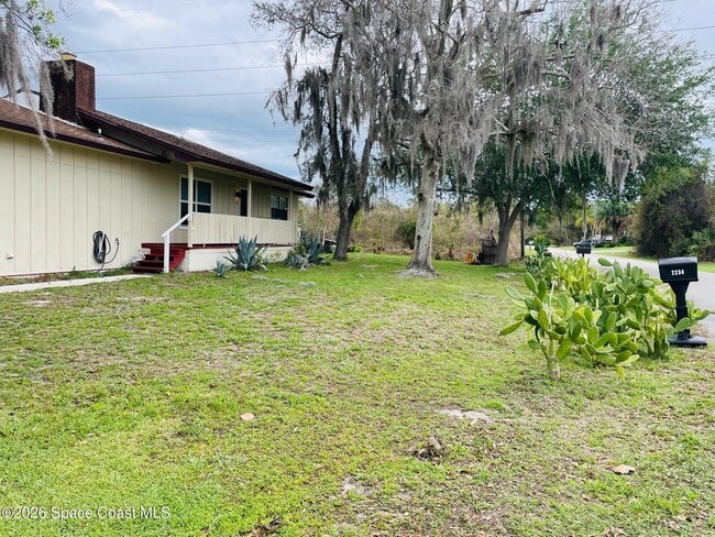 Building Photo - 2235 Macedo NE Rd