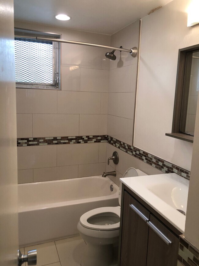 Recently updated bathrooms - 9700 E Bay Harbor Dr