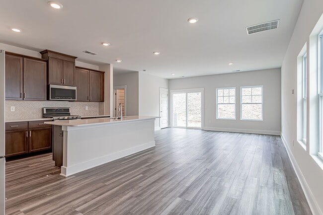 Building Photo - END UNIT! Townhome Off of Butler Rd