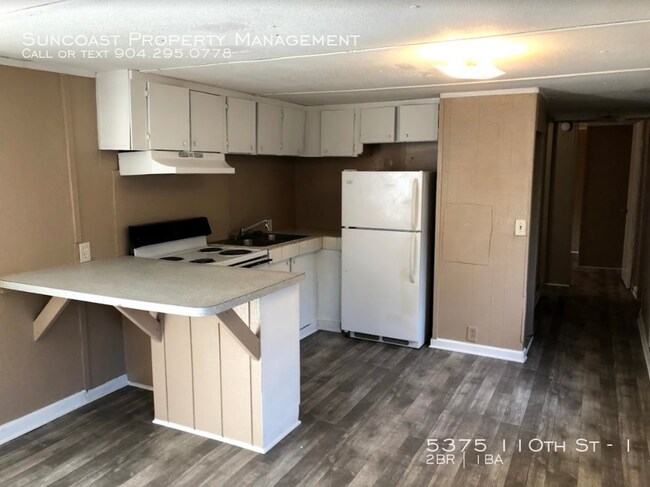 Building Photo - Hampton Oaks Unit #1