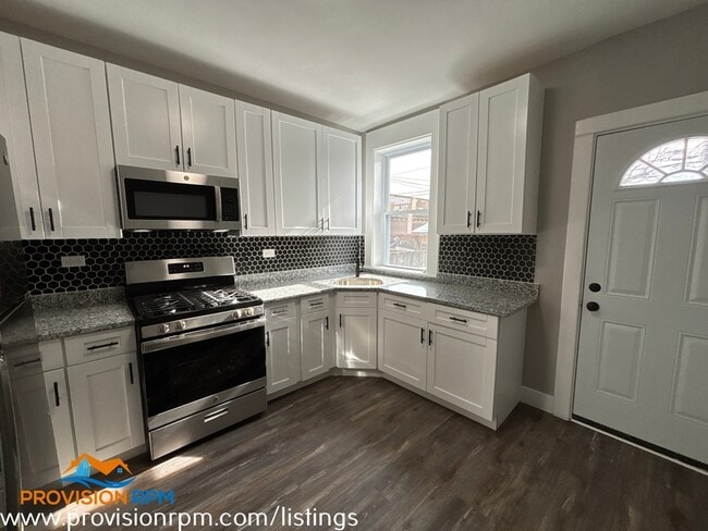 Photo - 6759 Woodley Rd Townhome