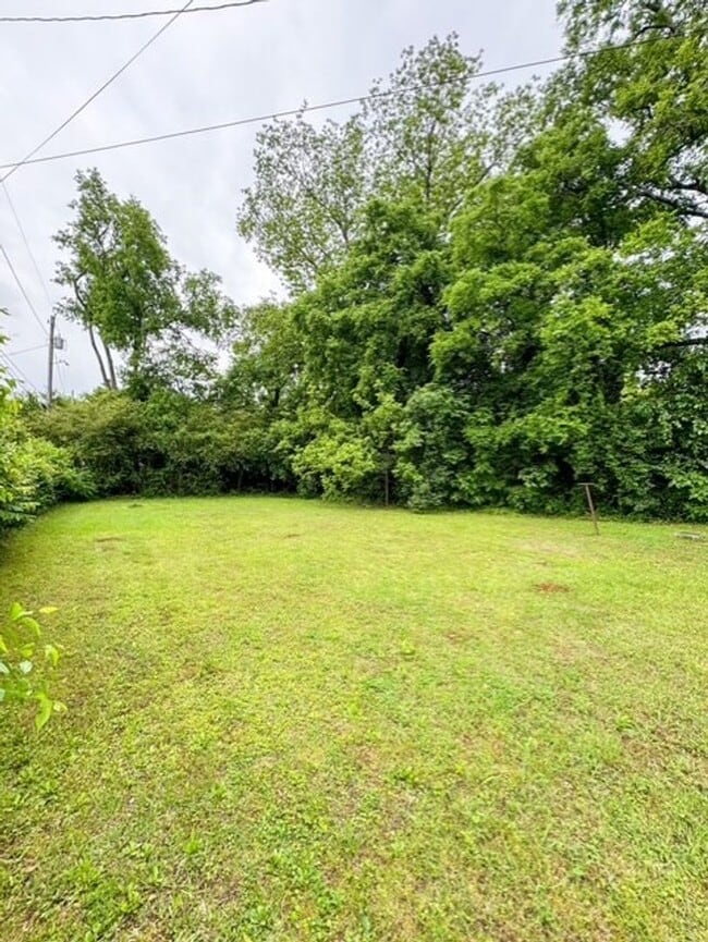 Building Photo - Spacious 4-Bedroom Home with Modern Upgrad...