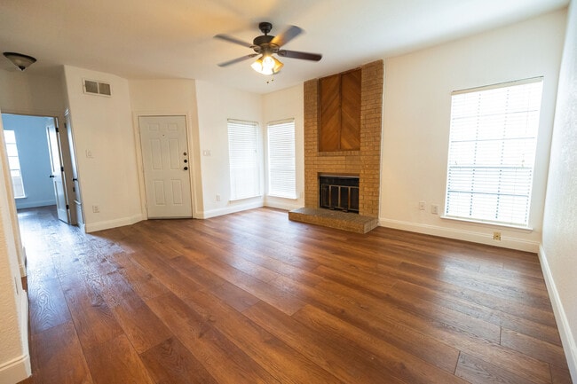 Bright and spacious living room with wide windows - 11609 April Dr