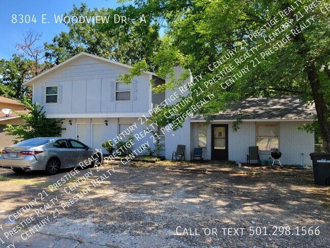Building Photo - 8304 Woodview Dr N