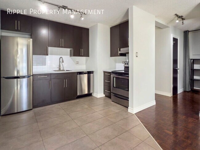 Photo du bâtiment - AMAZING 1 BED/ 1 BATH CONDO
