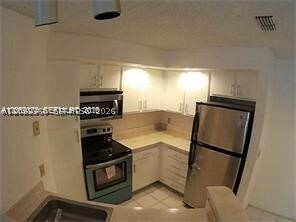 Foto del edificio - 3380 Pinewalk Dr N