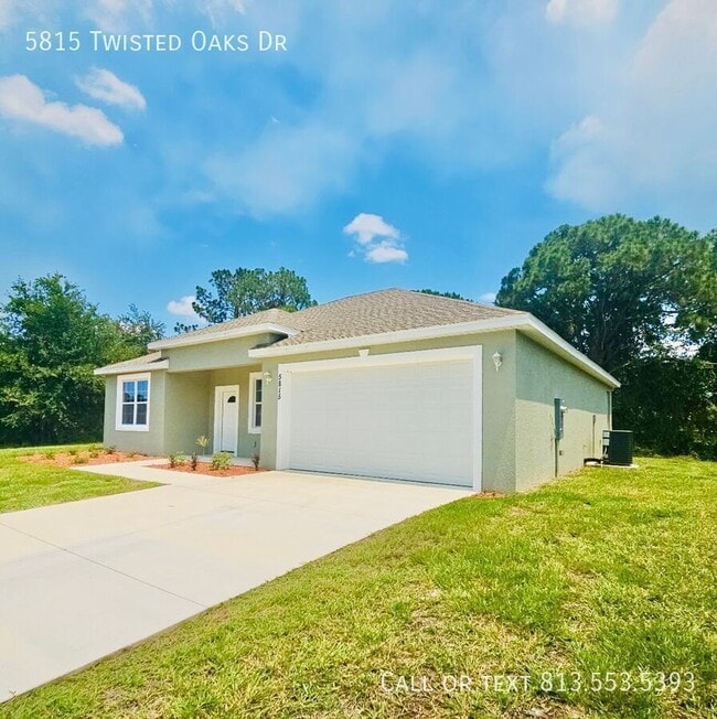 Foto del edificio - 5815 Twisted Oaks Dr