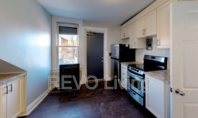Photo du bâtiment - 477-477 King St E