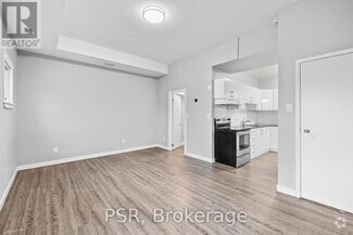 Building Photo - 205-205 Gerrard St E