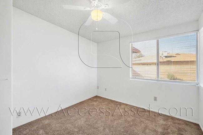 Building Photo - Single-Story 3 Bed with Covered Patio & Gated Yard