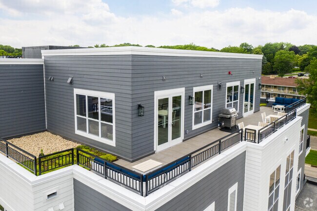 Área común de patio - The Hamptons at Hilldale