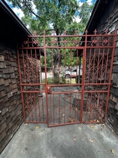 Gated breezeway between home and detached garage - 2105 Porter Way