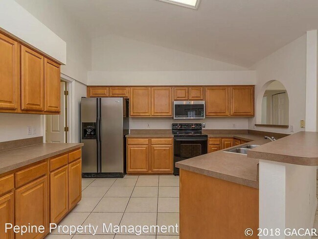 Building Photo - 4 br, 2 bath House - 5150 SW 81st Drive