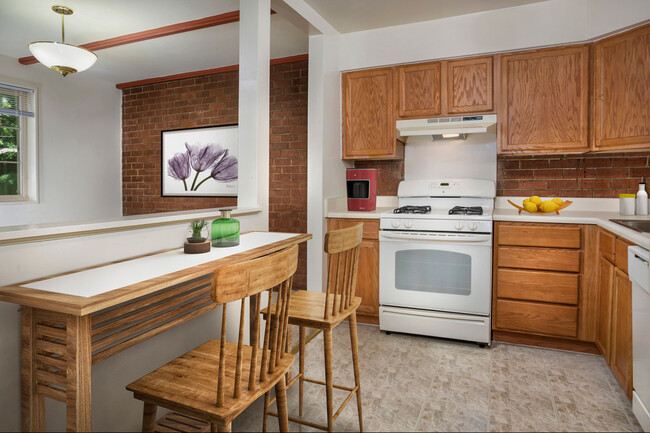 Big kitchen with lots of counter & storage space at Whitehall Square Apartments - Whitehall Square Apartments