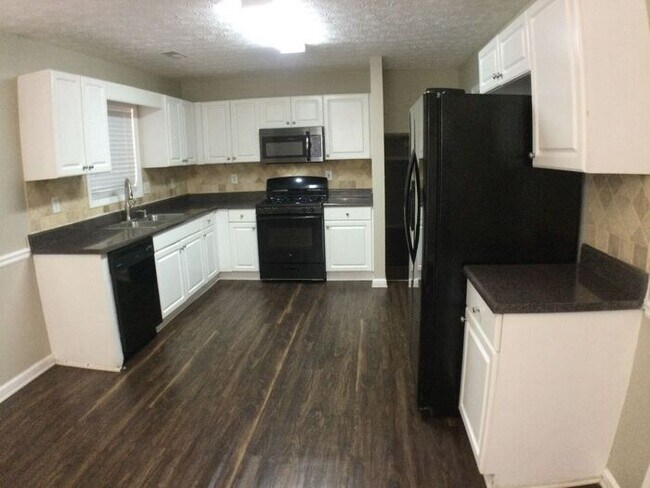 Building Photo - NOW AVAILABLE for QUICK MOVE IN