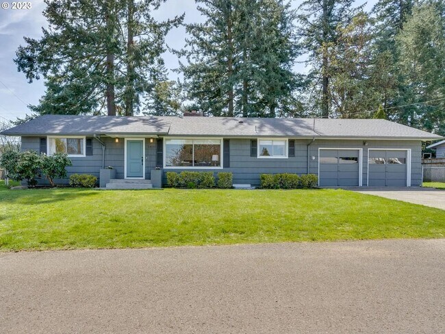 Building Photo - Stylishly Updated Mid-Century Gem on a Qui...