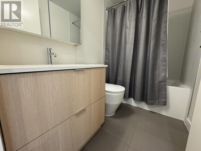 Photo du bâtiment - 308-2308 Alderson Ave