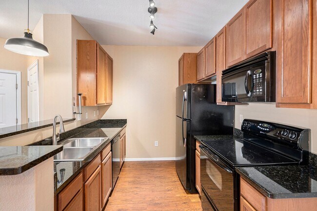 Building Photo - Two Bedroom Condo with Private Garage