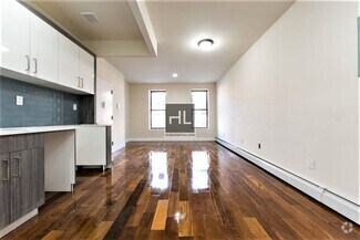 Building Photo - NEWLY RENOVATED COZY 3 BEDROOMS/ 2 BATHROO...