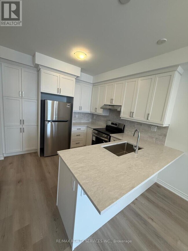 Photo du bâtiment - 75 Vinewood Cres