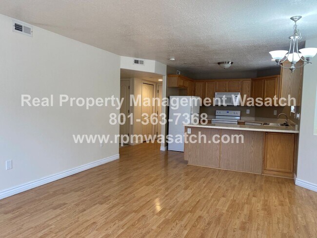 Building Photo - Check Out This Amazing 3 Bedroom 2 Bathroom Condo In Riverton! 50% Off First Month's Rent Move in...