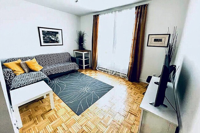 Building Photo - 4846 Rue Sainte-Catherine E