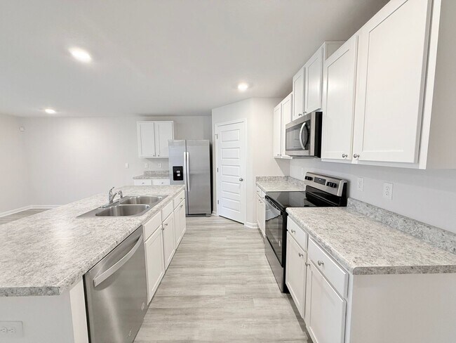 Foto del edificio - 4-Bedroom Home - Woodlands
